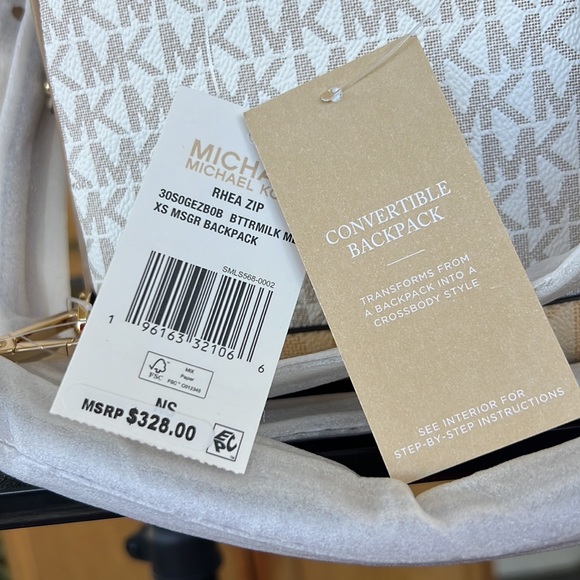 29. Michael Kors Signature Rhea Zip XS Backpack - Picture 9 of 10